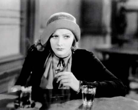 Greta Garbo takes a drink
