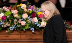 Amy Carter walks past the casket of her mother, former US first lady Rosalynn Carter, after speaking at a tribute service in Atlanta on 28 November. 