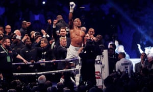 Anthony Joshua celebrates victory over Wladimir Klitschko after the World Heavyweight unification title boxing fight at Wembley Stadium in London