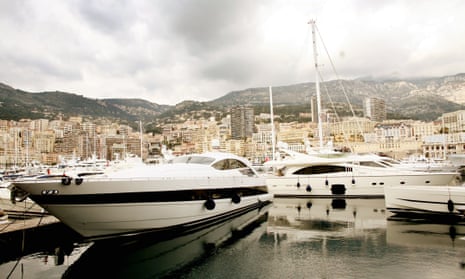 Luxury yachts moored in Monaco harbour.