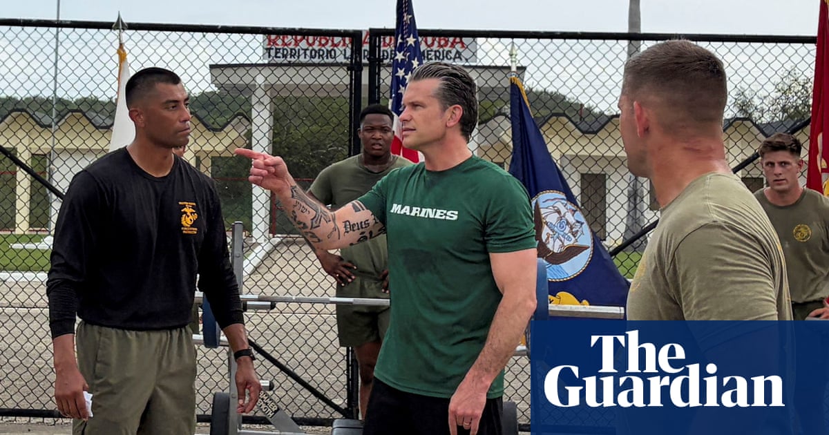 Pete Hegseth, dressed for CrossFit coup cosplay, warns Cuba about aggression while standing on an actual US military occupation and torture site.