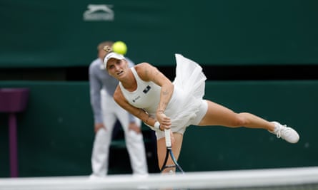 Marketa Vondrousova serves at Wimbledon