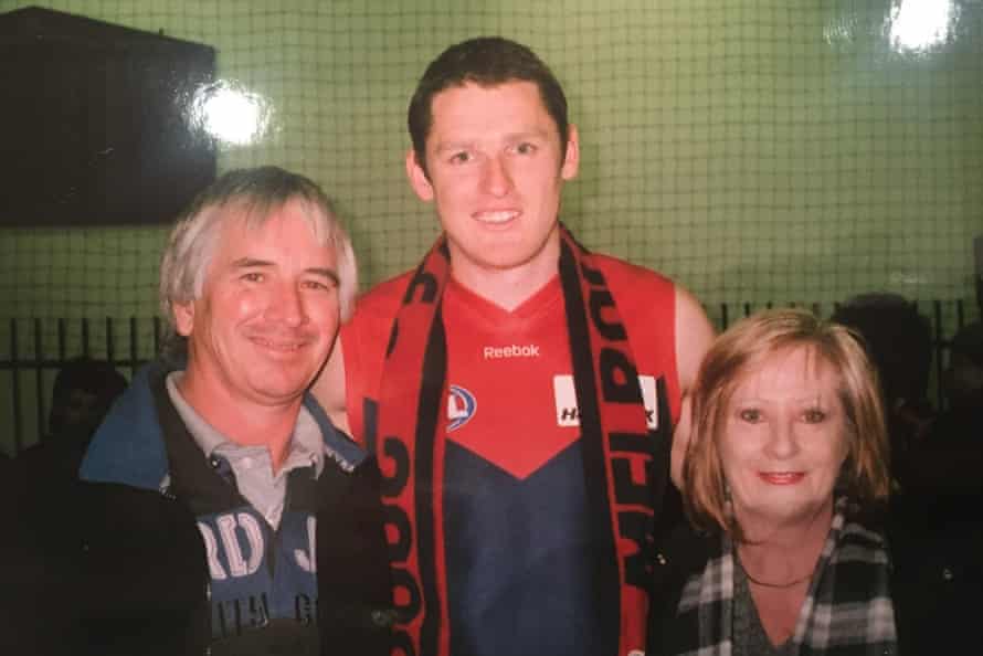 Wheatley senior and Maria alongside Paul’s nephew and namesake, Paul Wheatley, at the latter’s last AFL game for the Melbourne Demons in 2009.