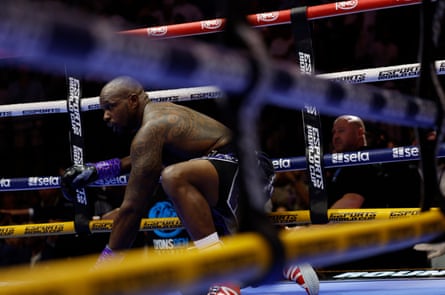 Dillian Whyte reacts after being knocked down