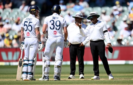 Ben Stokes and Jamie Smith speak to umpires Ahsan Raza and Nitin Menon after an appeal for Smith’s wicket is sent to the third umpire during day two of the third Test.