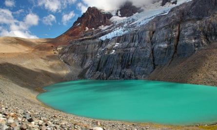 A beautiful turquoise glacier lake at the top of Cerro Castillo mountain. Blue sky with clouds.