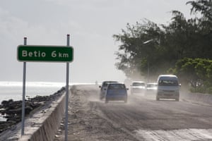 Cars on the Nippon causeway that joins Bairiki and Betio on South Tarawa.