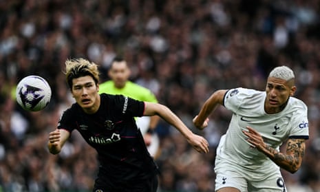 Luton’s Daiki Hashioka (left) battles with Richarlison for the ball during Saturday’s defeat at Tottenham.