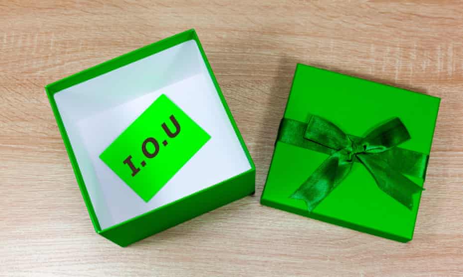 I.O.U message in an empty green gift box