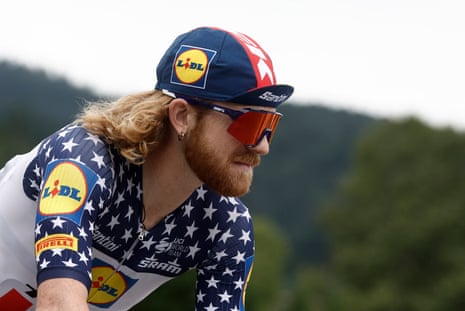 One of the more hirsute riders in the peloton, the American Quinn Simmons (Lidl-Trek) pedals his way down to the start ahead of stage three.