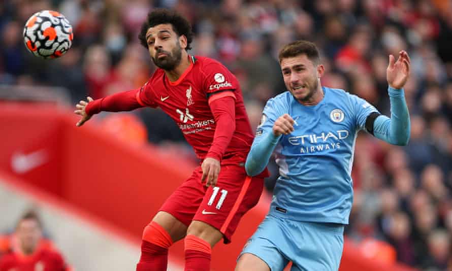 Aymeric Laporte challenges Mohamed Salah during Manchester City’s Premier League match at Liverpool this season.