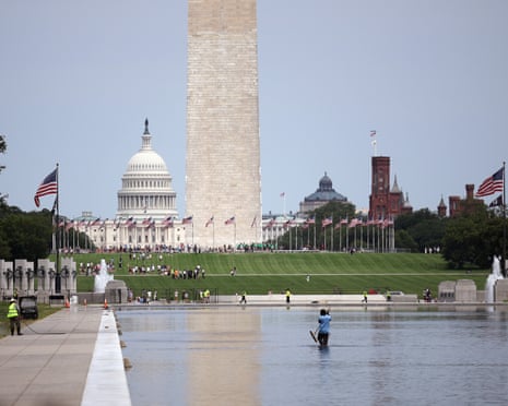 Workers continue to clean and prepare the Lincoln Memorial Reflecting Pool as it is filled with water on Tuesday.