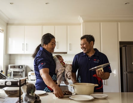 Aloita Tekapu and Alesana Teikale prepare lunch for their four sons including one-month-old Philip in their new home in Pakenham.