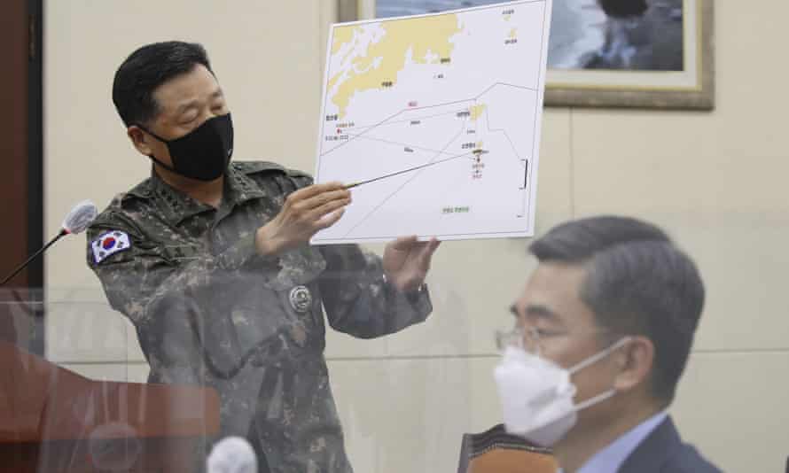 A South Korean military official gives a briefing on North Korea’s shooting of a South Korean at the National Assembly in Seoul on Thursday.