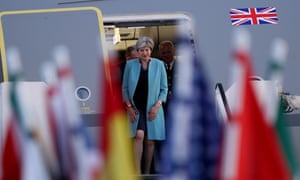Prime minister Theresa May arrives at Hamburg Airport for the G20 economic summit.
