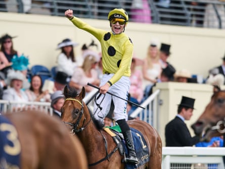 Billy Loughnane stands up in the saddle and punches the air after Bow Echo’s win
