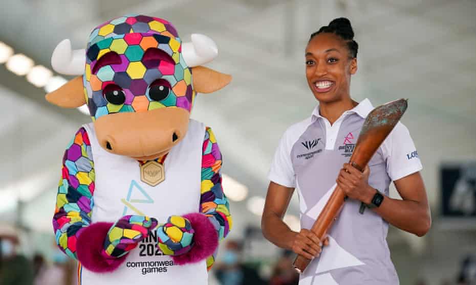 England netball international Layla Guscoth alongside Perry the official mascot for the Birmingham 2022 Commonwealth Games, with the Queen’s baton. 