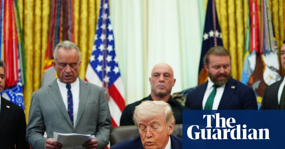 Donald Trump, RFK Jr, and Joe Rogan stand in the Oval Office like they’re about to launch a wellness podcast, while the FDA quietly screams into a clipboard off camera.
