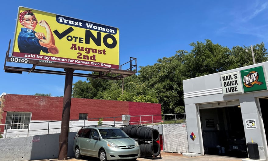 A billboard in Kansas City urges Kansas voters to say 'no' to a proposed amendment that would assert there's no right to abortion.