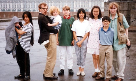 Moses (front right) with Woody Allen and Mia Farrow and children Satchel, Lark, Dylan, Fletcher, Daisy and Soon-Yi.