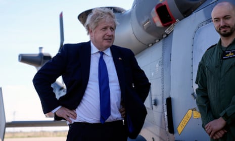 Boris Johnson meets RAF crew and technical staff during a visit to Lydd airport in Kent