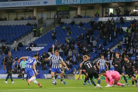 Brighton and Hove Albion defender Dan Burn shoots to make it 3-2.