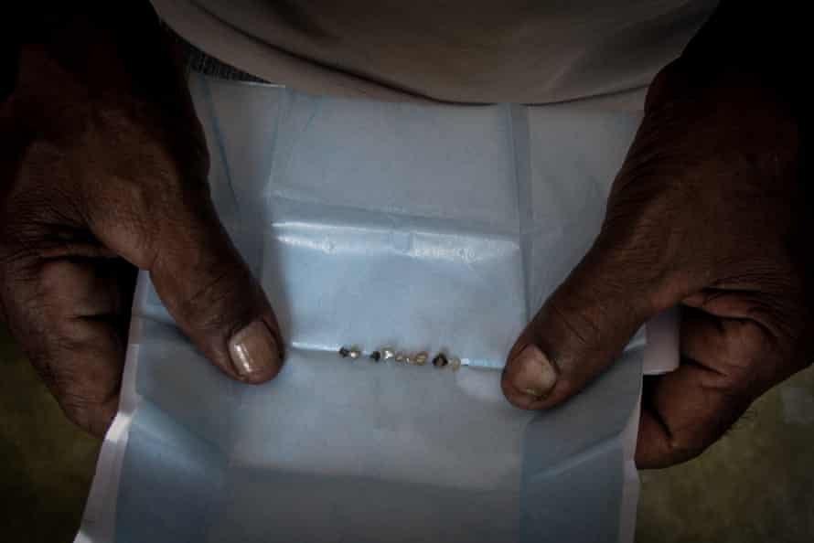 A miner displays the diamonds he has taken from streams in Chapada Diamantina, Bahia State.