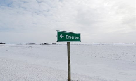 Sign post for the small border town of Emerson, near the Canada-US border crossing in Manitoba, where refugees make their way often on foot into the province.