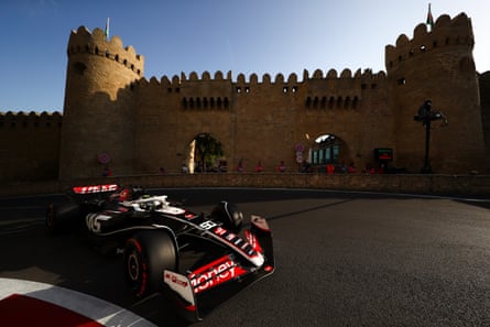 Oliver Bearman drives through the streets of Baku.