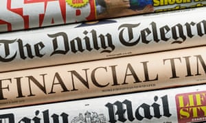 Newspapers on a news stand