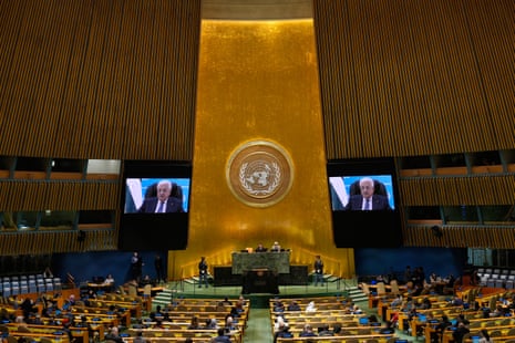A view of the general assembly hall with two large screens showing Abbas’s video address.