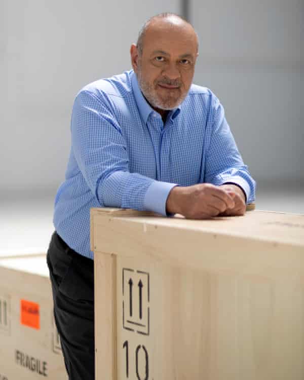 Dimitris Daskalopoulos with boxes of his renowned art collection.