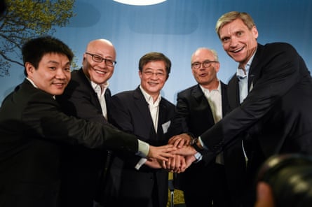 (LtoR) Syngenta future director for China Chen Hongbo, China national chemical corporation vice-president Robert Lu, its Chairman Ren Jianxin, Syngenta future vice-chairman and lead Independent director Michel Demare (2ndR) and current CEO Erik Fyrwald (R) pose after a press conference in 2017 after the company’s takeover by ChemChina