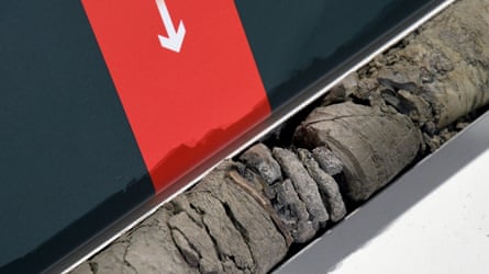 Part of a fossilized vertebrae from an herbivorous dinosaur found deep under the parking lot.