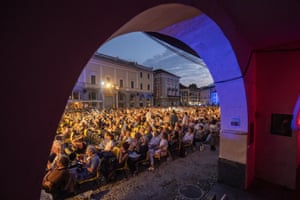 Locarno, Switzerland. People watch a movie at the Piazza Grande during the 75th Locarno international film festival