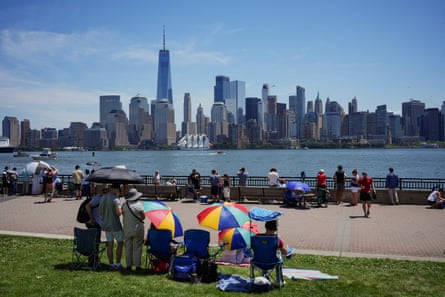 people guidelines by h2o pinch metropolis skyline successful background