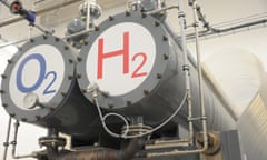 Tanks marked with O2 for oxygen and H2 for hydrogen, part of the electrolysis installations, at a hybrid power plant in Germany