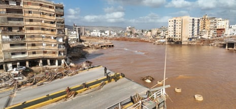 A large mass of water where a coastal road once stood in Derna