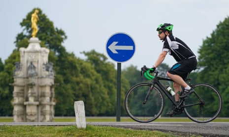 A cyclist in Bushy Park, south-west London, during the Covid-19 crisis