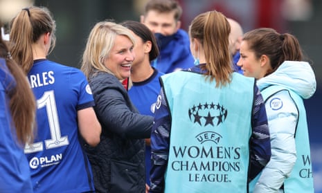 Emma Hayes (centre) with her players after they beat Bayern Munich to reach the Champions League final.