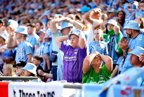 Coventry City fans react during the Sky Bet Championship play-off final against Luton Town at Wembley Stadium.