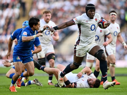 Maro Itoje breaks clear while under pressure from Ange Capuozzo during the Six Nations match between England and Italy.