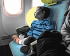 The kindness of strangers: I was a ball of stress taking my four children on an international flight – then a passenger tucked a blanket around my sleeping son