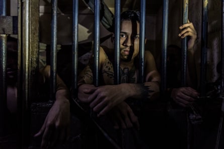 Prisoners crammed into their cells at a police station. Although prison overcrowding has been an issue for decades, the Venezuelan prison system has now reached the point of collapse