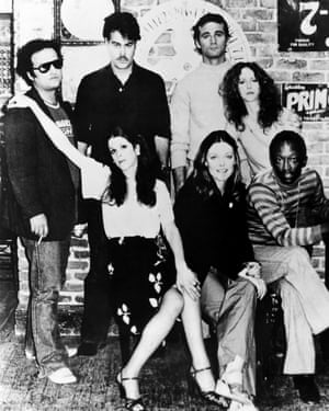 Stars of Saturday Night Live c1977, clockwise from left, Belushi, Dan Aykroyd, Bill Murray, Laraine Newman, Garrett Morris, Jane Curtin and Gilda Radner.
