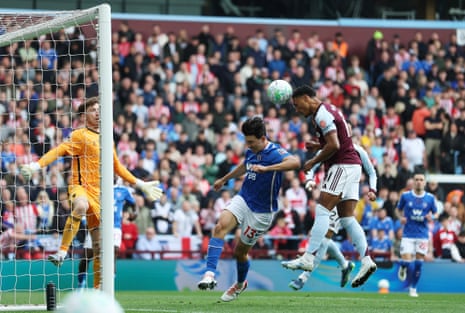 Ollie Watkins of Aston Villa scores his team's first goal.