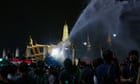 Thai police fire water cannon