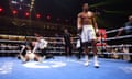 Anthony Joshua returns calmly to his corner after knocking out Francis N'Gannou in Riyadh, Saudi Arabia.