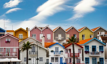 Aveiro’s sister town, Costa Nova, has colourful buildings formerly used to store fishing gear.