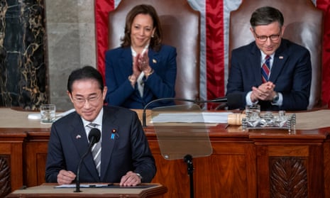 Fumio Kishida, prime minister of Japan, delivers an address to Congress as Kamala Harris and Mike Johnson listen. 